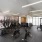 Room with fitness equipment and large windows