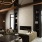 Close-up view of the Norden Range clubroom fireplace with comfortable seating and elegant design elements.
