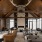 Full view of the Norden Range clubroom showcasing seating areas, a fireplace, and a large screen with Nordic accents.