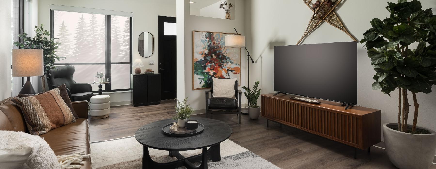 a living room with a large television