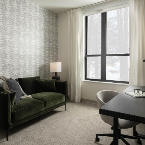 Generous living spaces to relax and unwind a living room with a couch and a table
